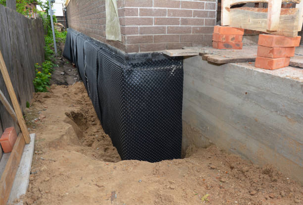 SJ Waterproofing Pros technician performing targeted Emergency Waterproofing assessment in New Germany, MN
